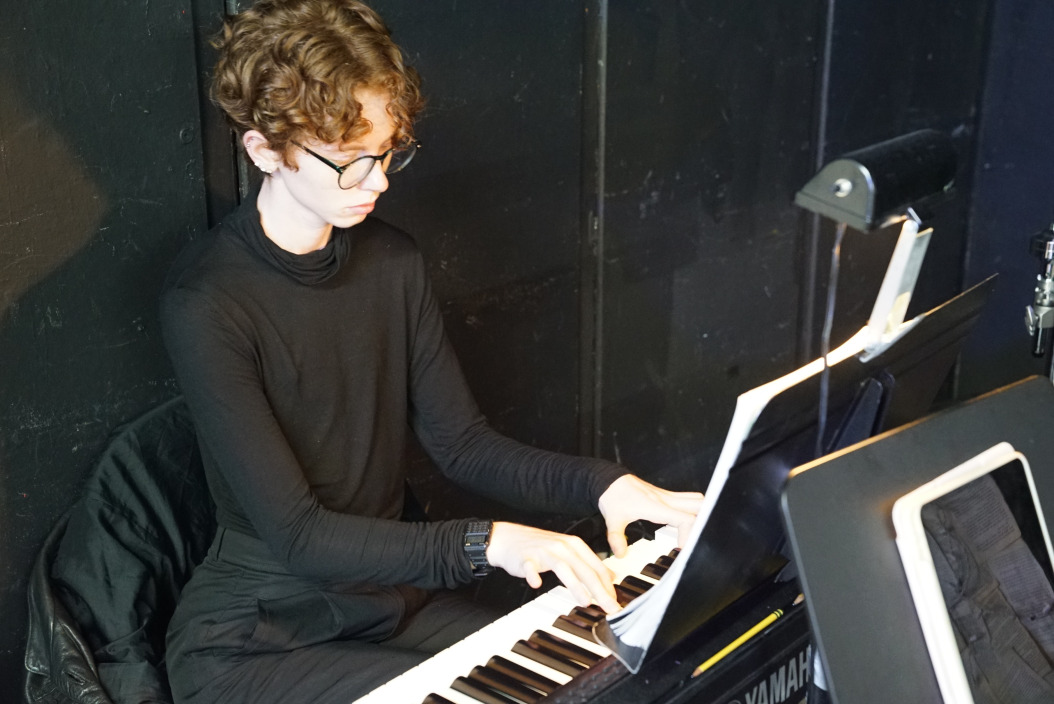 Julian is playing keyboard